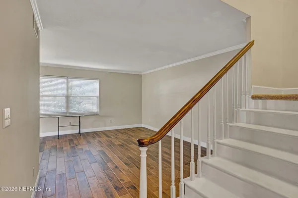 a bathroom with a shower and a sink