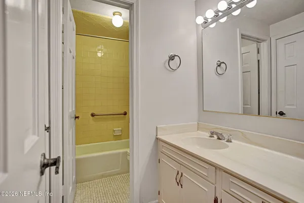 a bathroom with a shower and a toilet