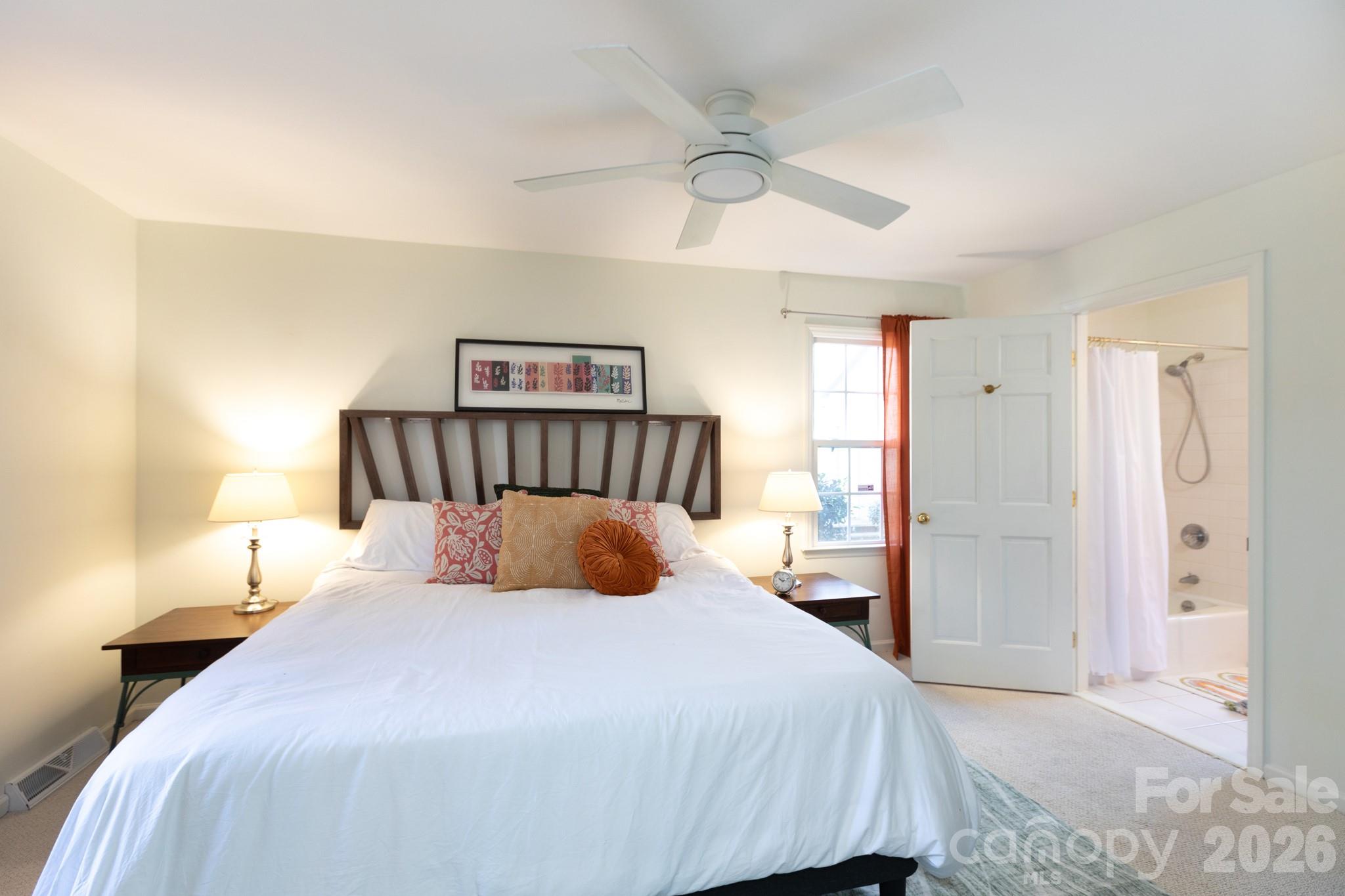 7423 Kuck Road Mint Hill, NC 28227 - Photo 13 of 31 a bedroom with a bed and a window