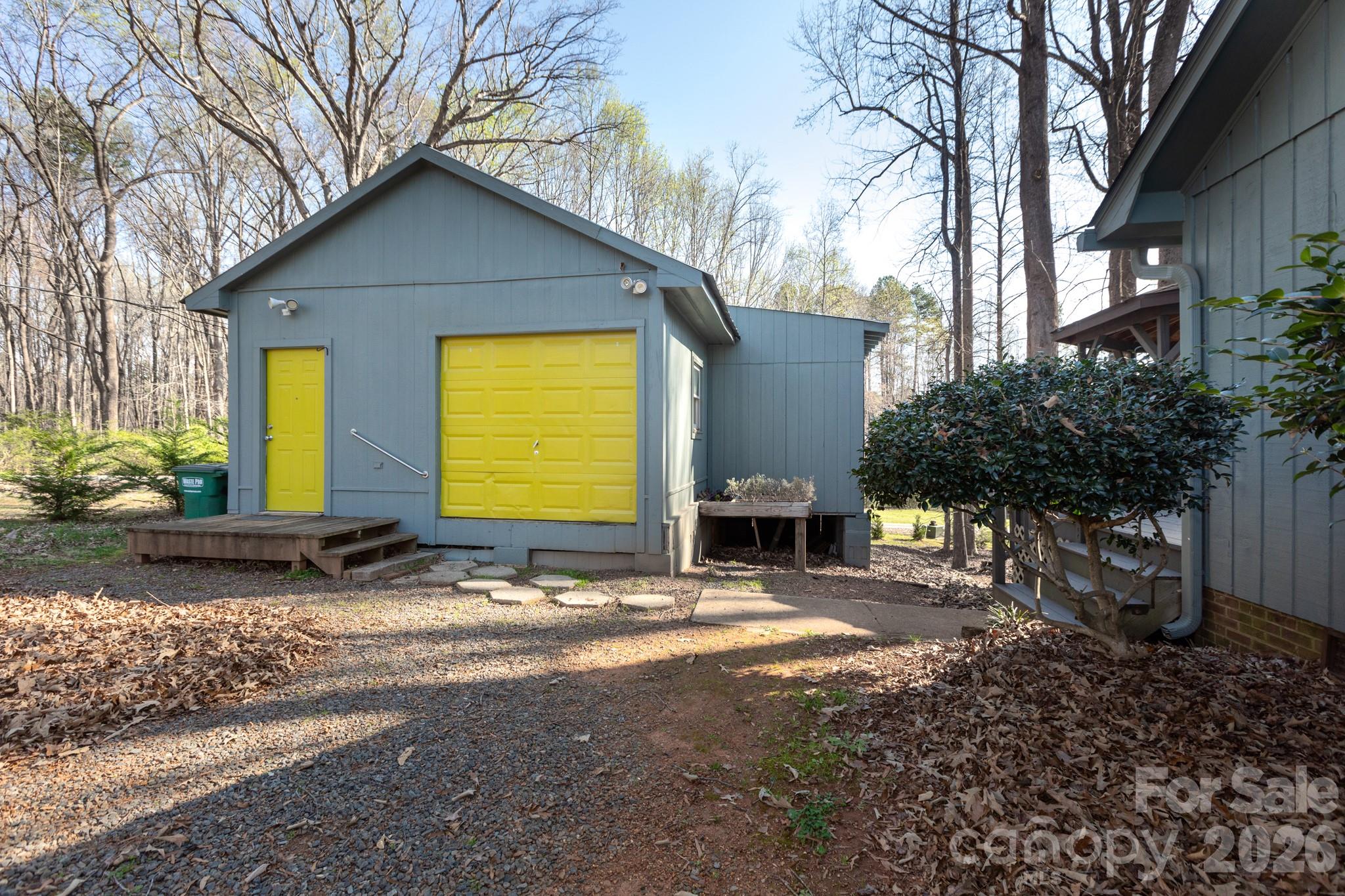 7423 Kuck Road Mint Hill, NC 28227 - Photo 27 of 31 a view of a house with a yard and tree s