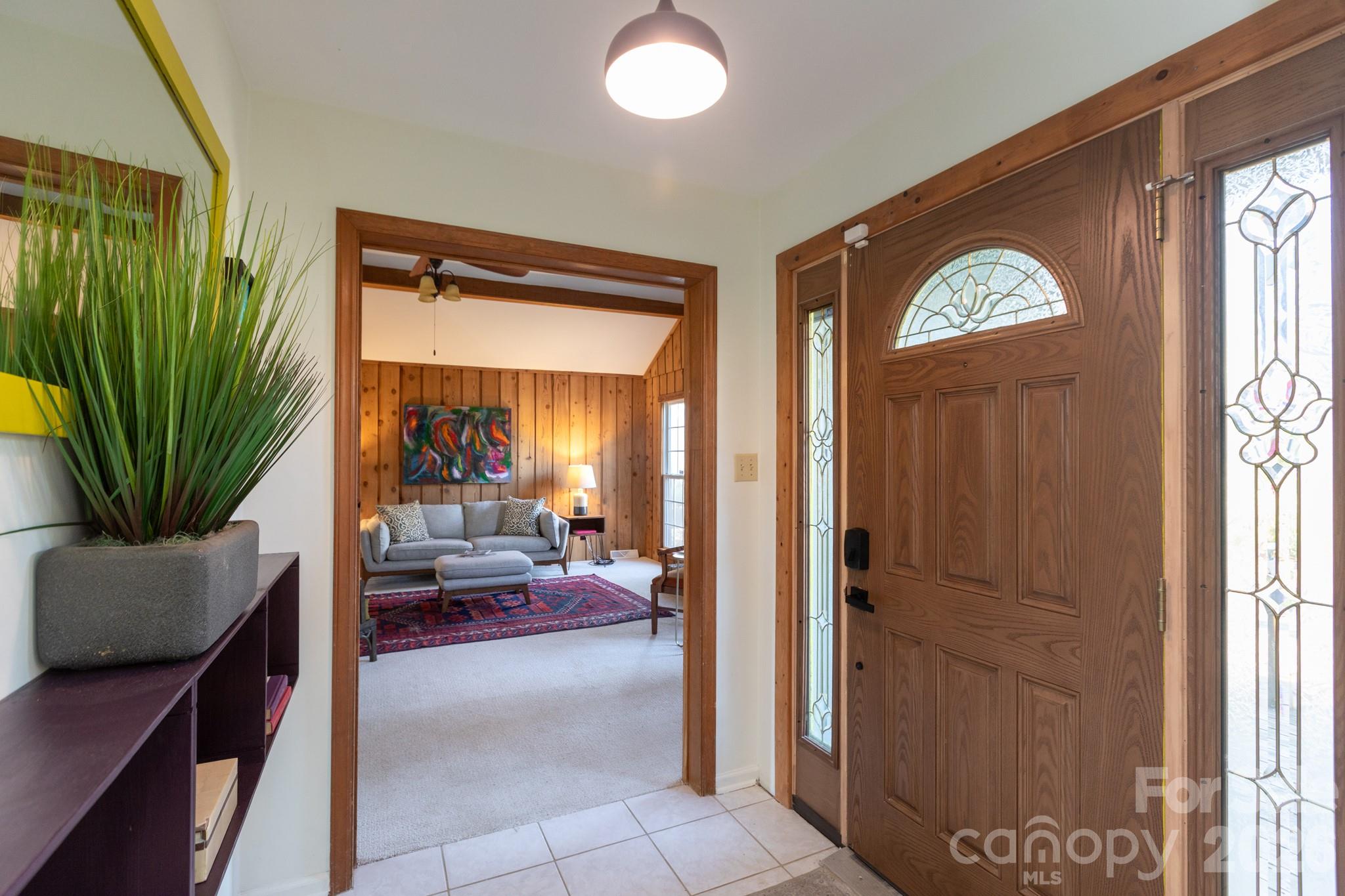 7423 Kuck Road Mint Hill, NC 28227 - Photo 3 of 31 a view of a hallway and interior of the house