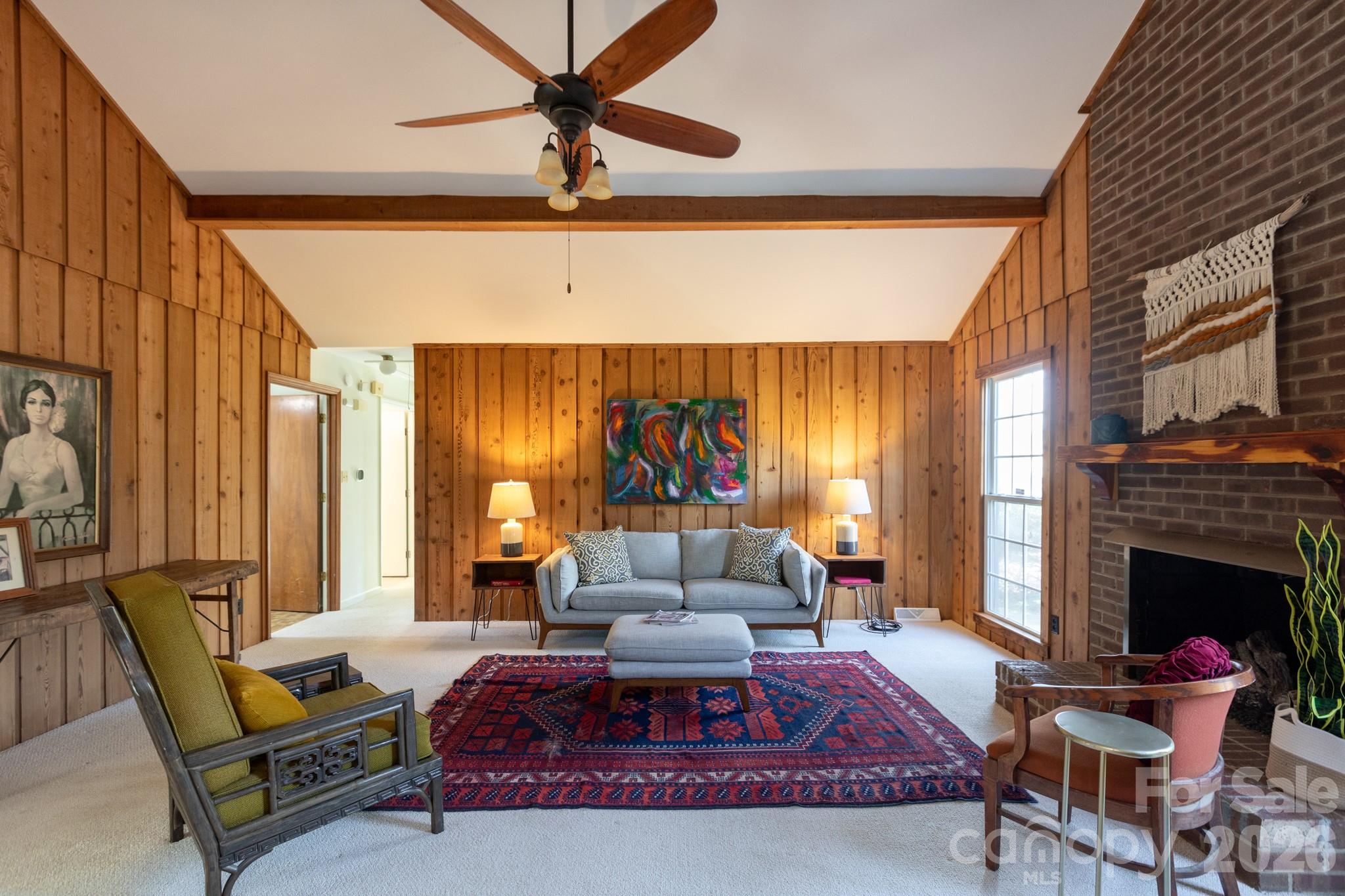 7423 Kuck Road Mint Hill, NC 28227 - Photo 4 of 31 a living room with furniture and a fireplace
