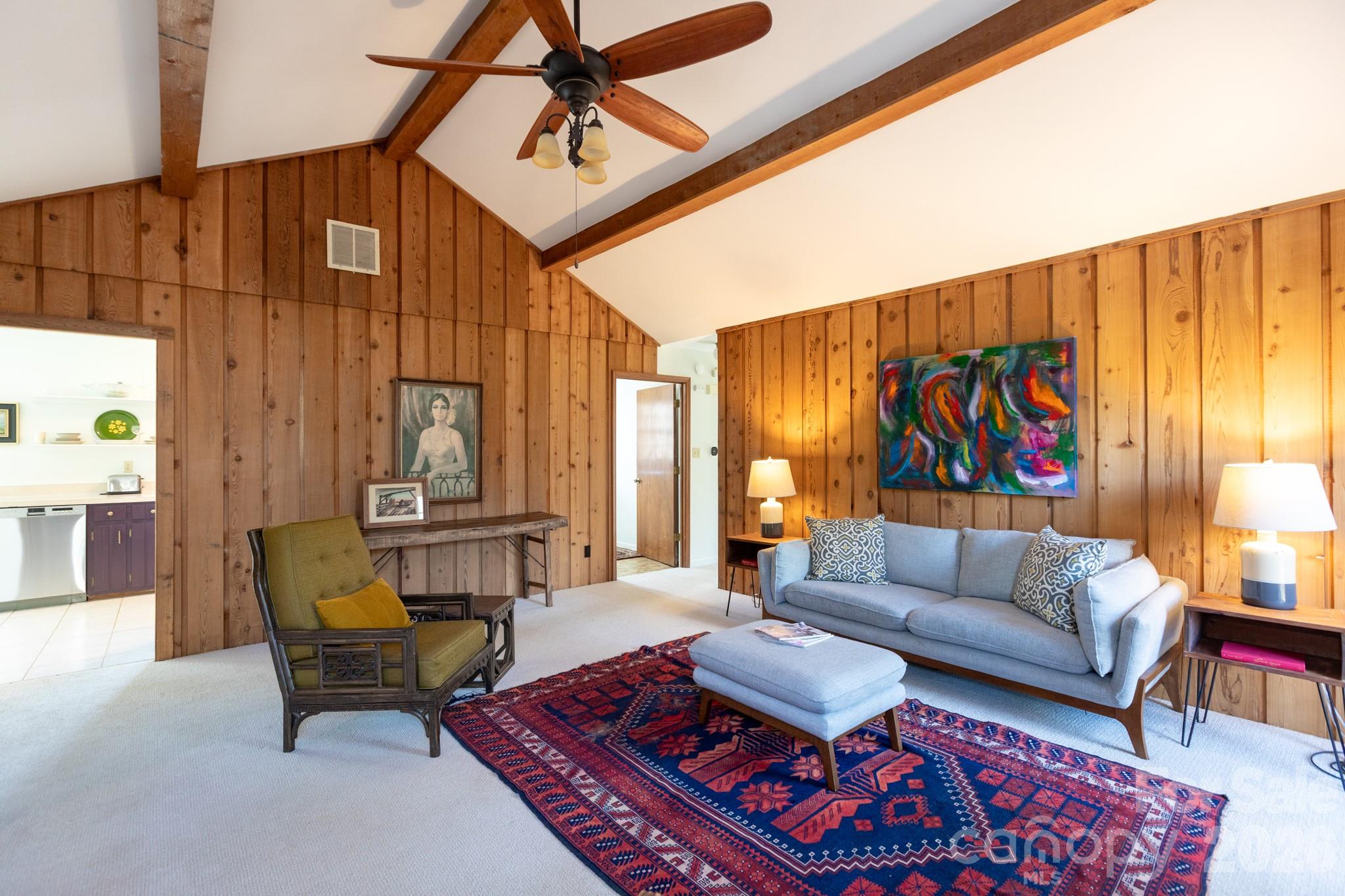7423 Kuck Road Mint Hill, NC 28227 - Photo 7 of 31 a living room with furniture and a rug