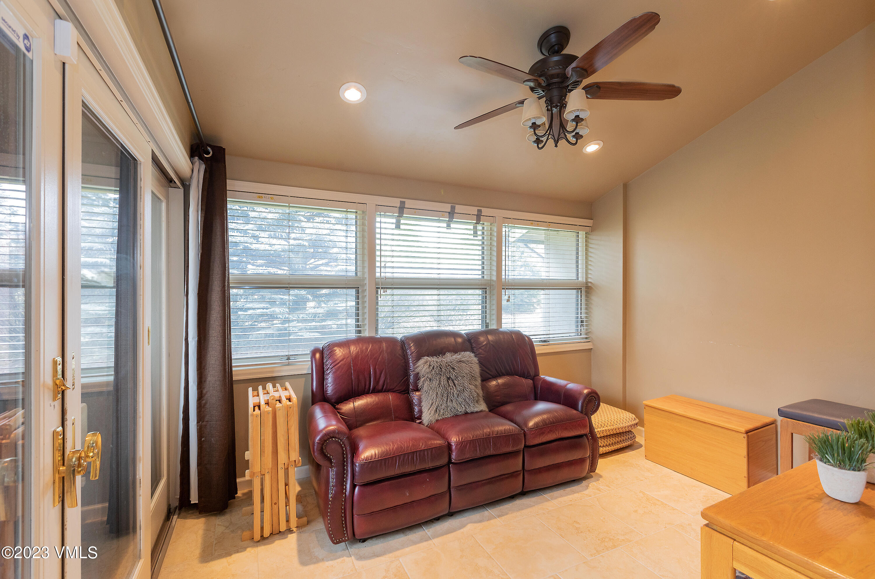 10 Stetson Drive, Unit A Edwards, CO 81632 - Photo 11 of 26 a living room with furniture ceiling fan and a window