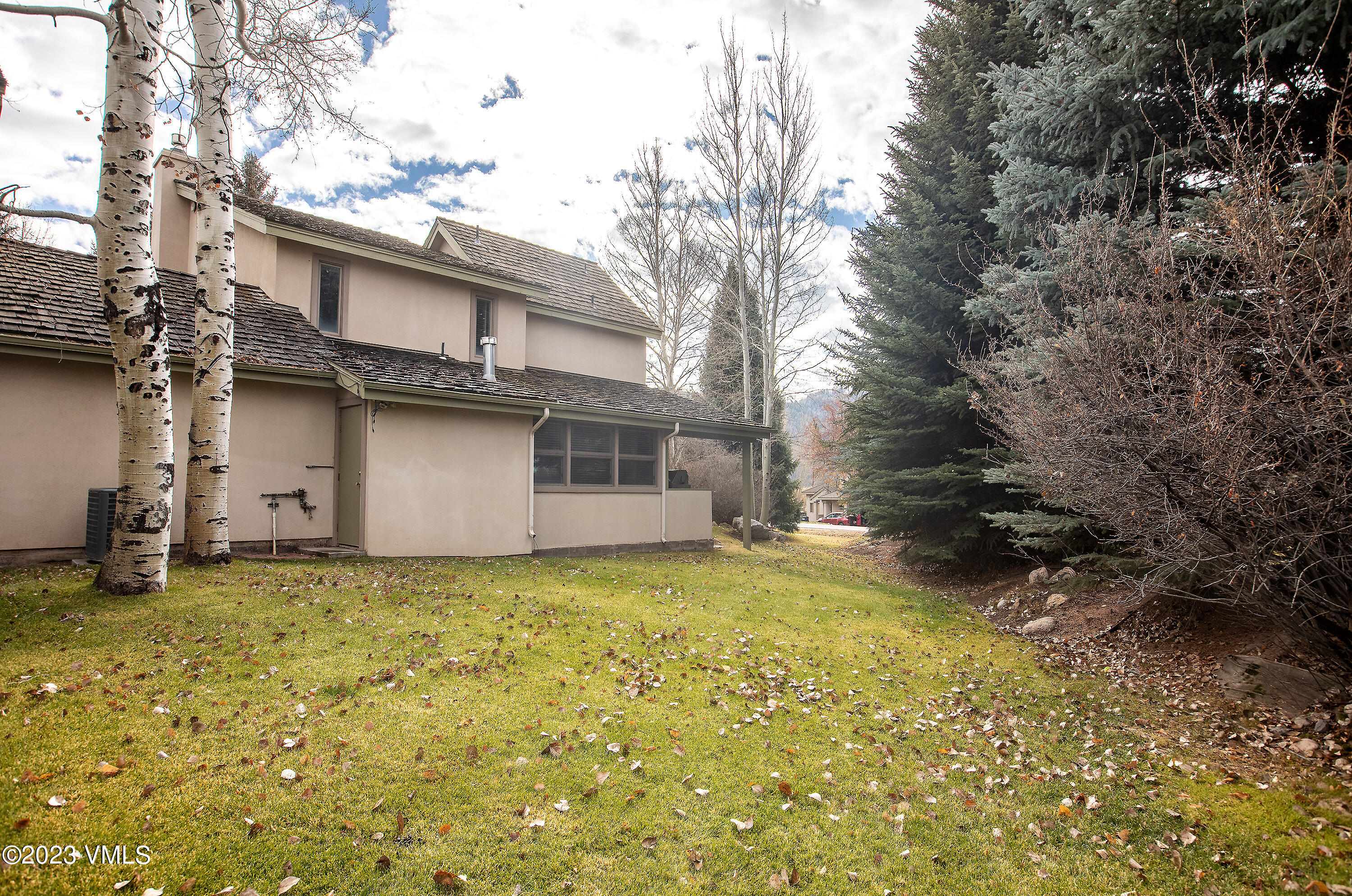 10 Stetson Drive, Unit A Edwards, CO 81632 - Photo 15 of 26 a view of a house with a yard