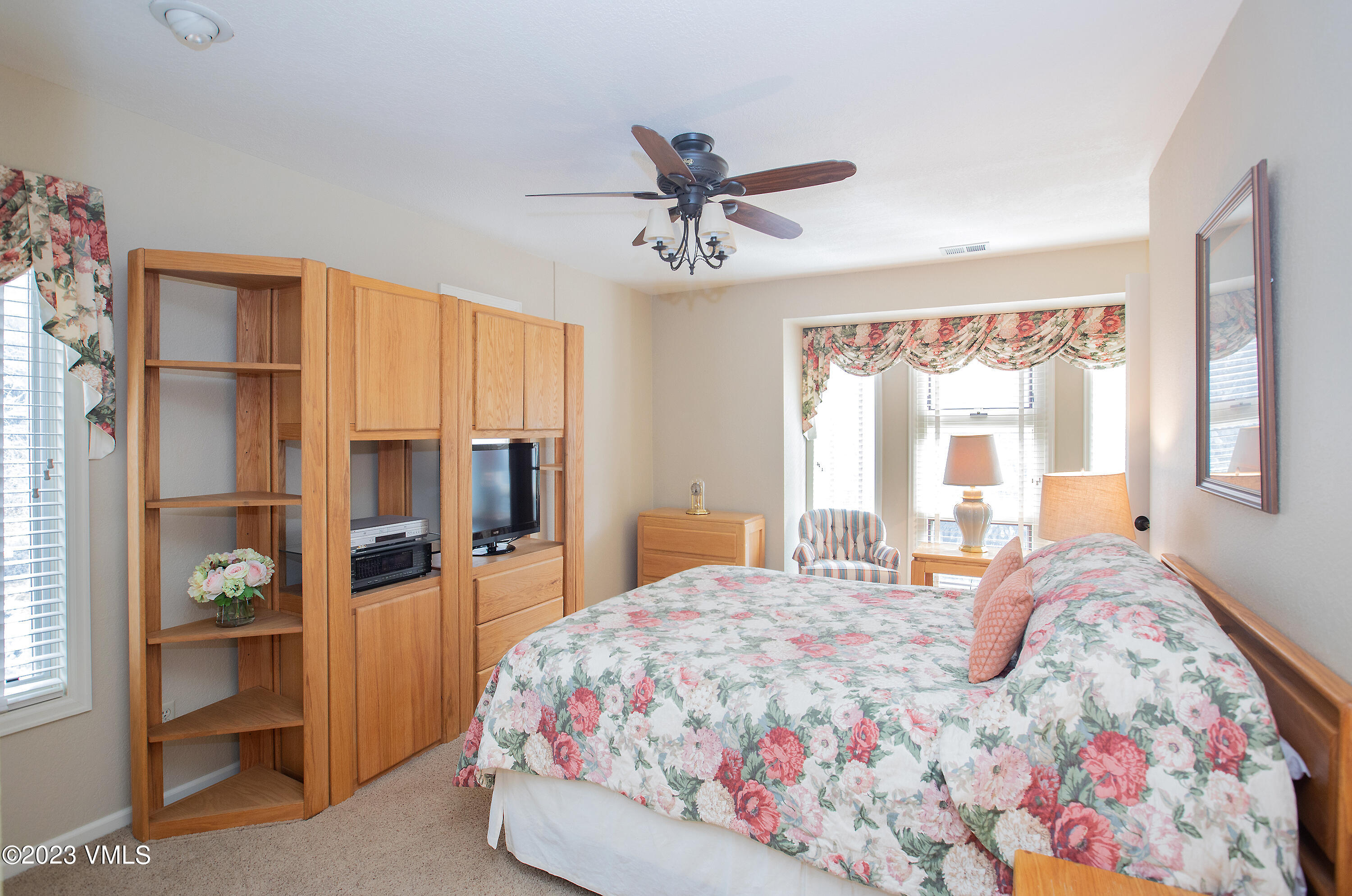 10 Stetson Drive, Unit A Edwards, CO 81632 - Photo 21 of 26 a bedroom with a bed dresser and window