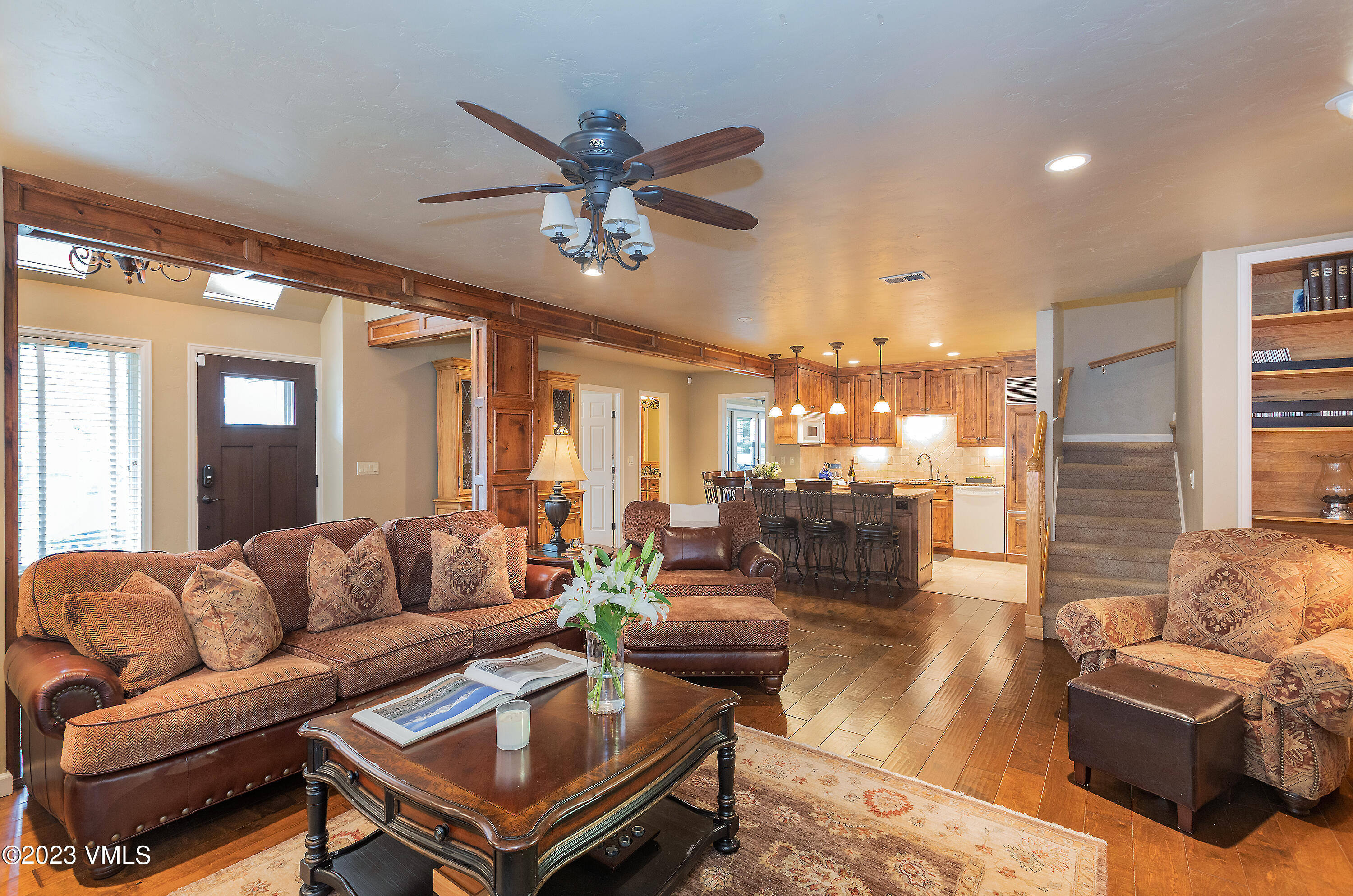 10 Stetson Drive, Unit A Edwards, CO 81632 - Photo 4 of 26 a living room with furniture and a large mirror