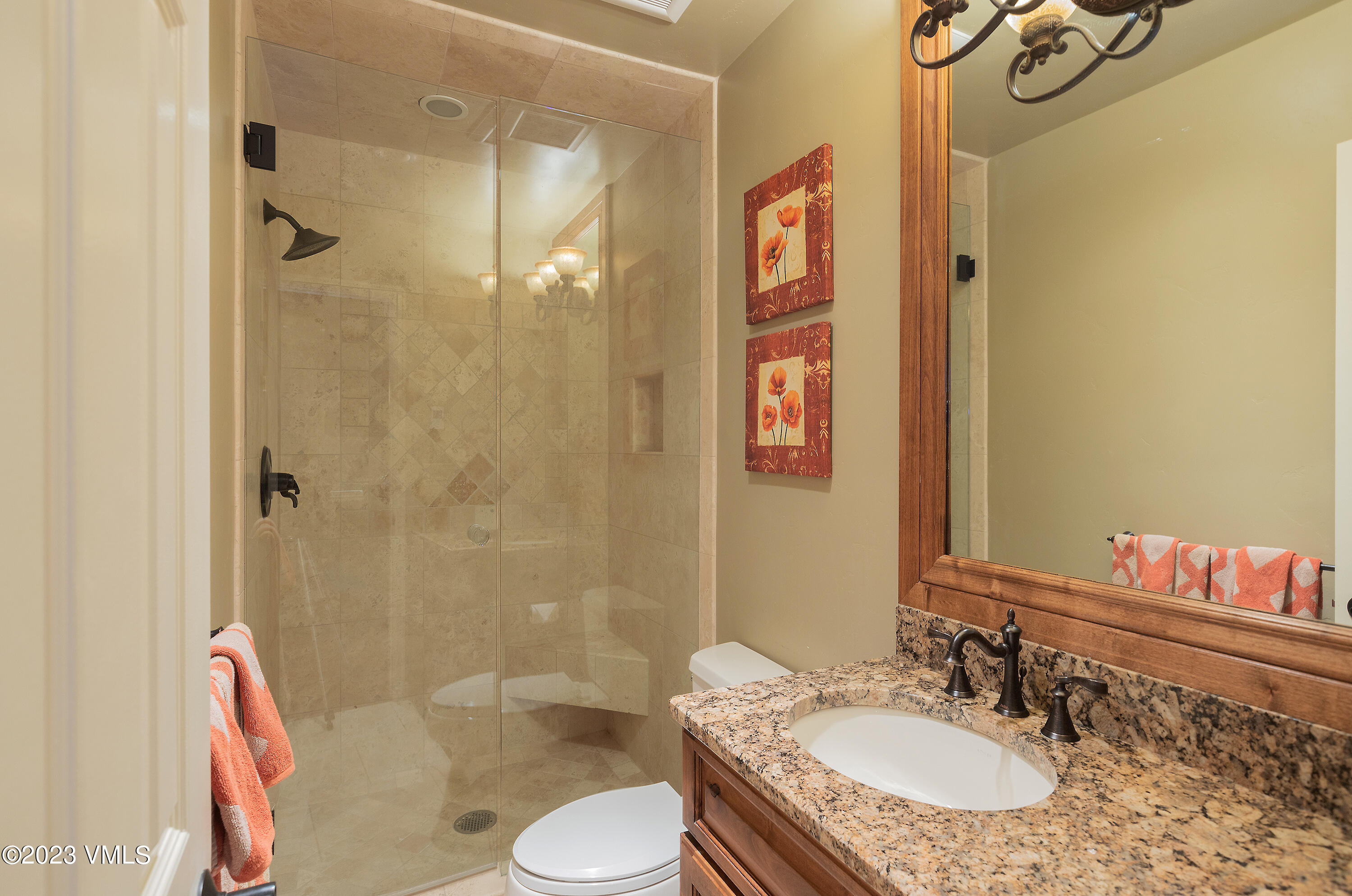 10 Stetson Drive, Unit A Edwards, CO 81632 - Photo 10 of 26 a bathroom with a granite countertop sink toilet and shower