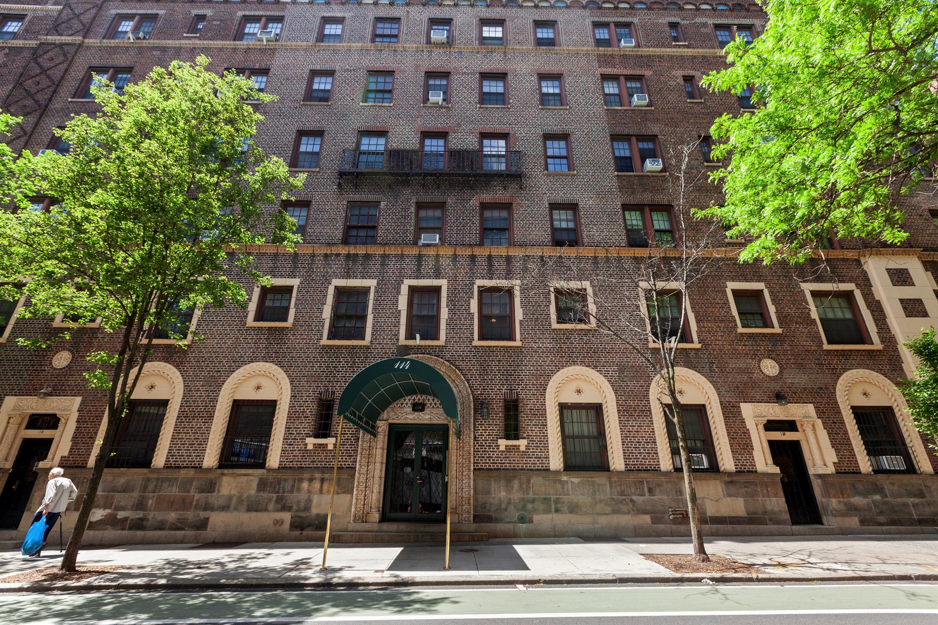 a front view of a multi story residential apartment building