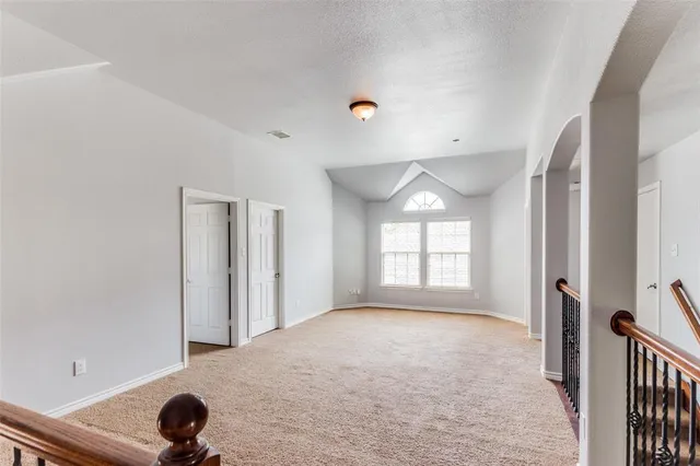a view of entryway and hall with a window