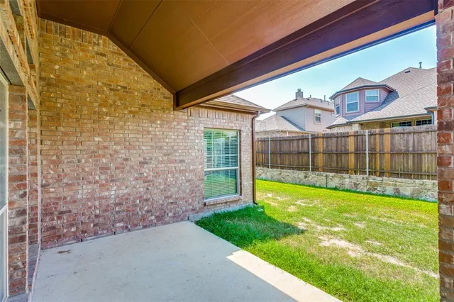 a view of a backyard with a garden