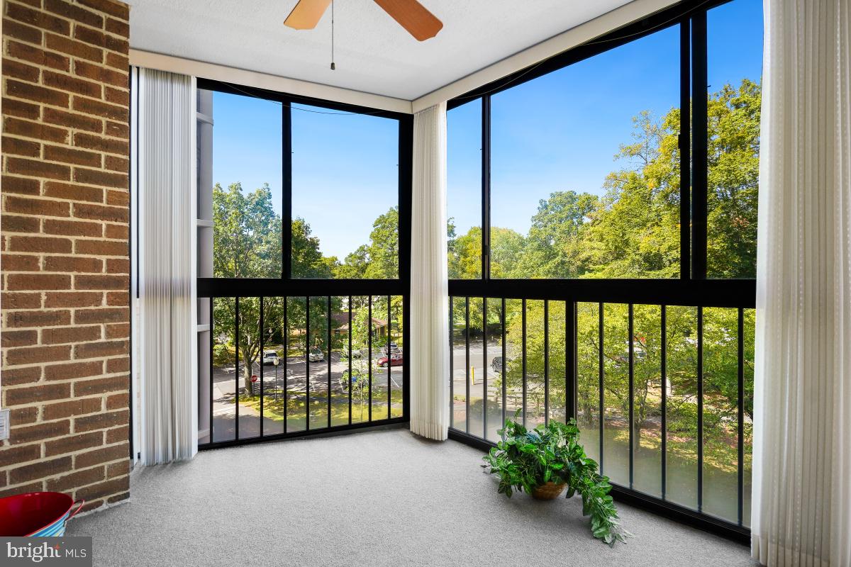 15107 Interlachen Drive, Unit 2321 Silver Spring, MD 20906 - Photo 33 of 35 a view of a room with large windows