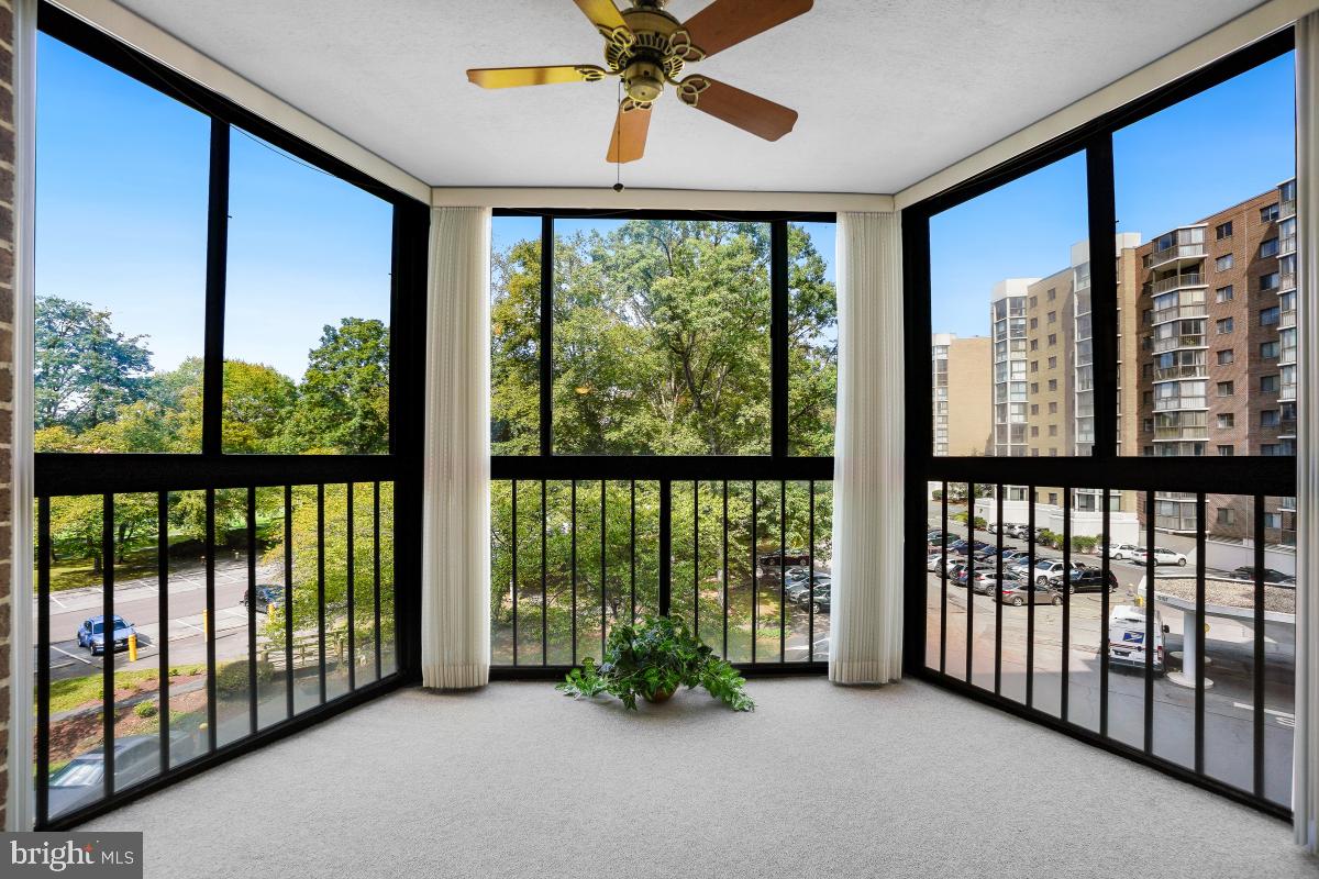 15107 Interlachen Drive, Unit 2321 Silver Spring, MD 20906 - Photo 6 of 35 a view of a glass door with a balcony