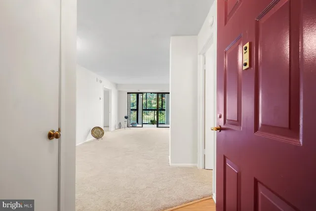 a view of an entryway with a livingroom