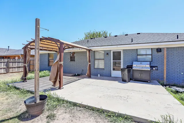 a view of a balcony with a tree