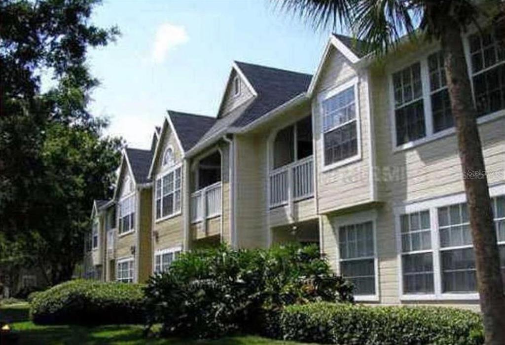 1057 South Hiawassee Road, Unit 1918 Orlando, FL 32835 - Photo 21 of 26 a front view of a multi story residential apartment building