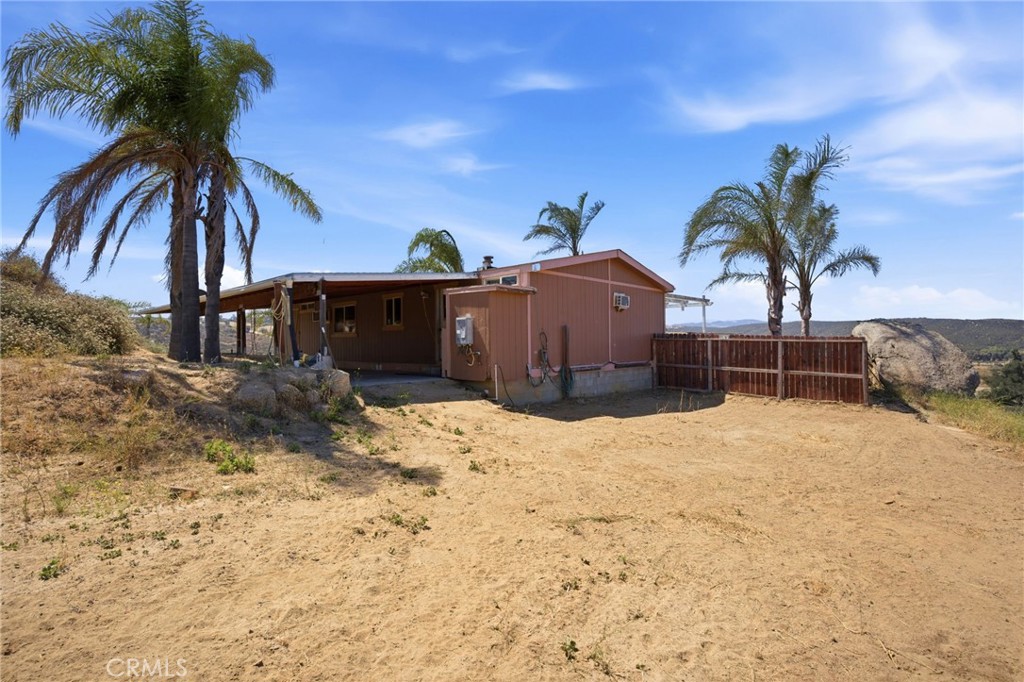 40100 Owl Valley Road Temecula, CA 92592 - Photo 37 of 44 a view of a backyard of a house