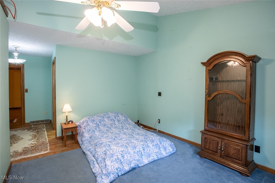 4962 Nettleton Road Medina, OH 44256 - Photo 20 of 43 Bedroom featuring baseboards and a ceiling fan