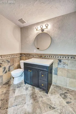 a bathroom with a bathtub and a sink