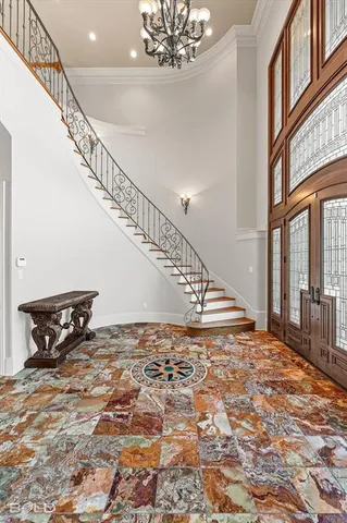 a view of staircase with a rug