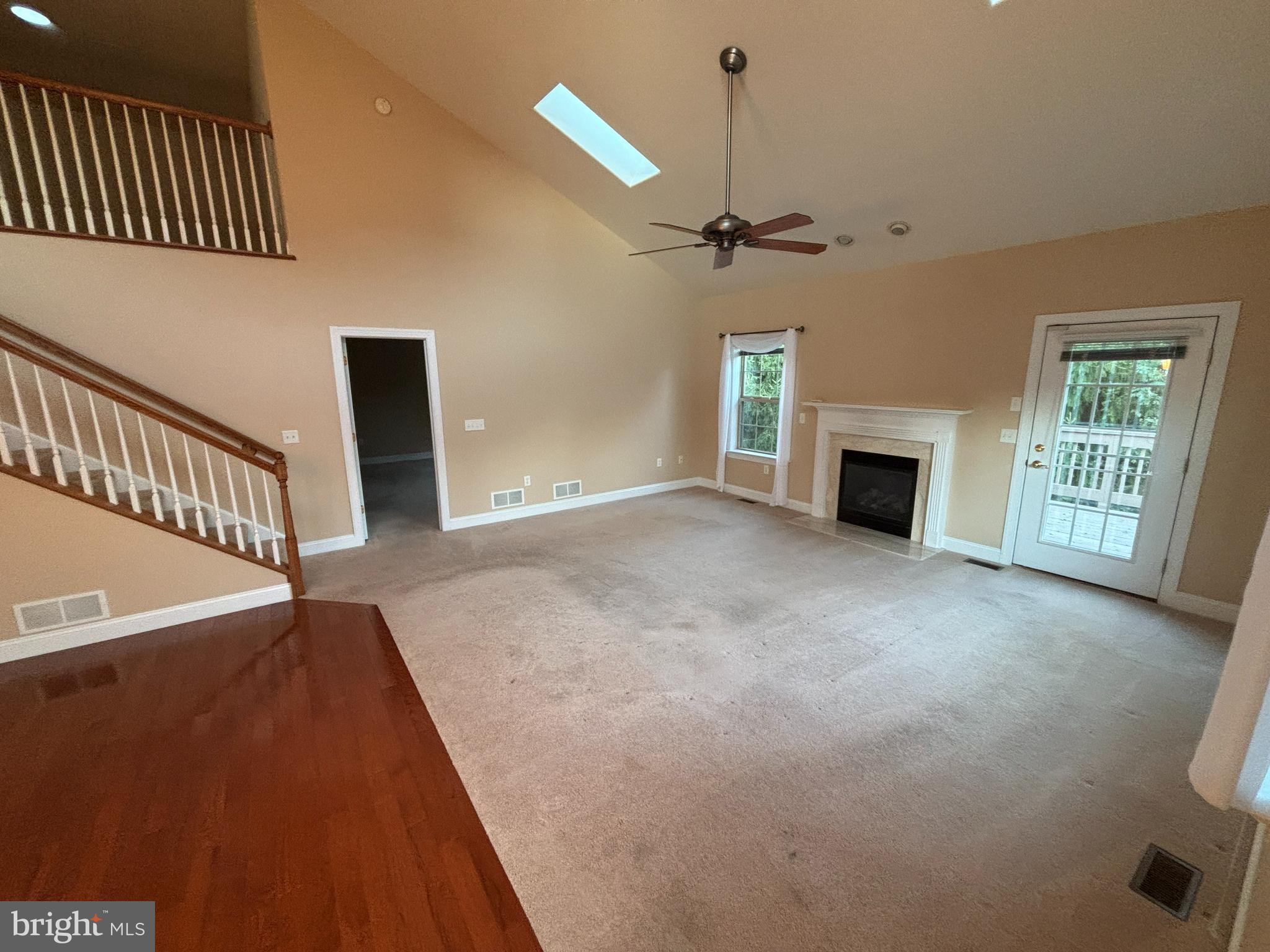 4300 North Victoria Way Harrisburg, PA 17112 - Photo 15 of 41 a view of an empty room with a fireplace and a window