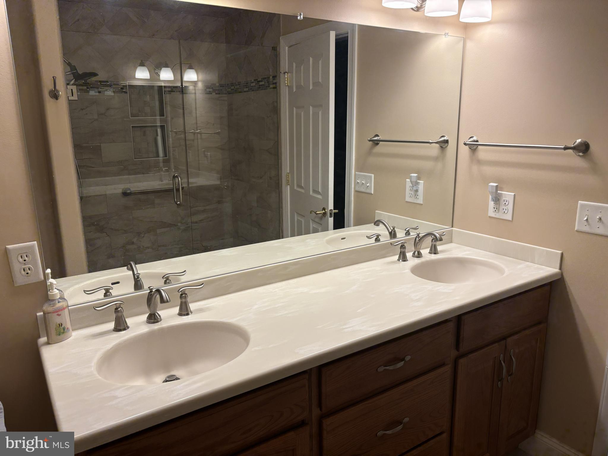 4300 North Victoria Way Harrisburg, PA 17112 - Photo 21 of 41 a bathroom with a sink and a mirror