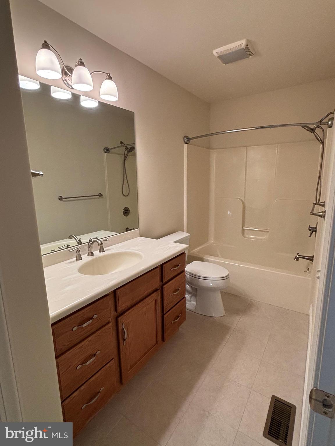 4300 North Victoria Way Harrisburg, PA 17112 - Photo 30 of 41 a bathroom with a double vanity sink mirror and toilet