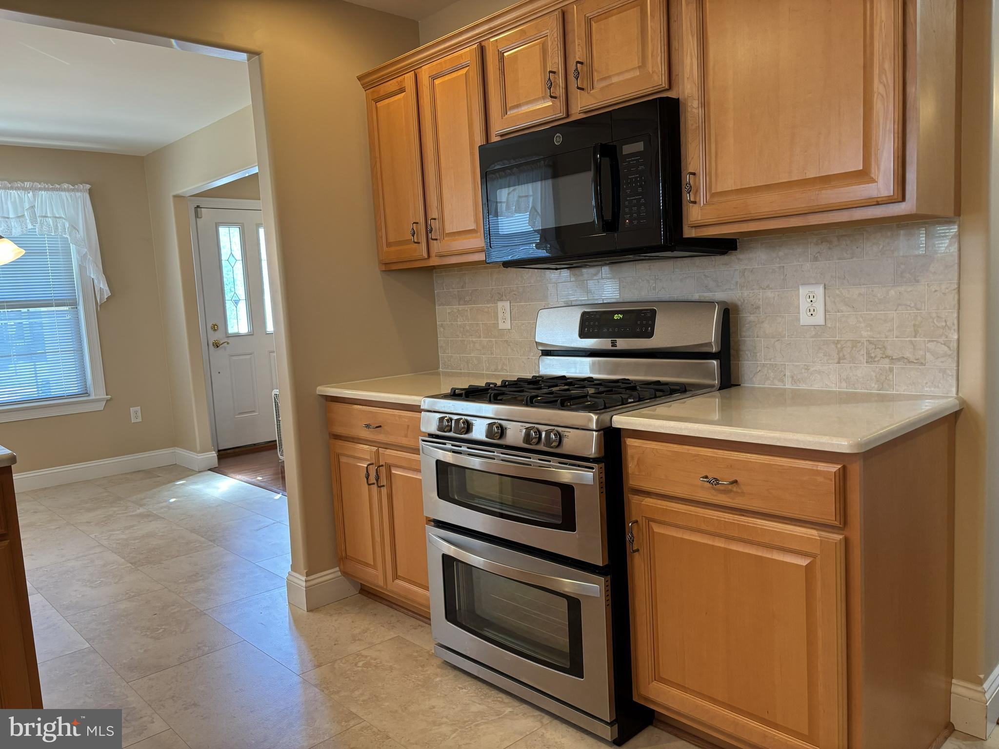 4300 North Victoria Way Harrisburg, PA 17112 - Photo 6 of 41 a kitchen with stainless steel appliances granite countertop a stove microwave and cabinets