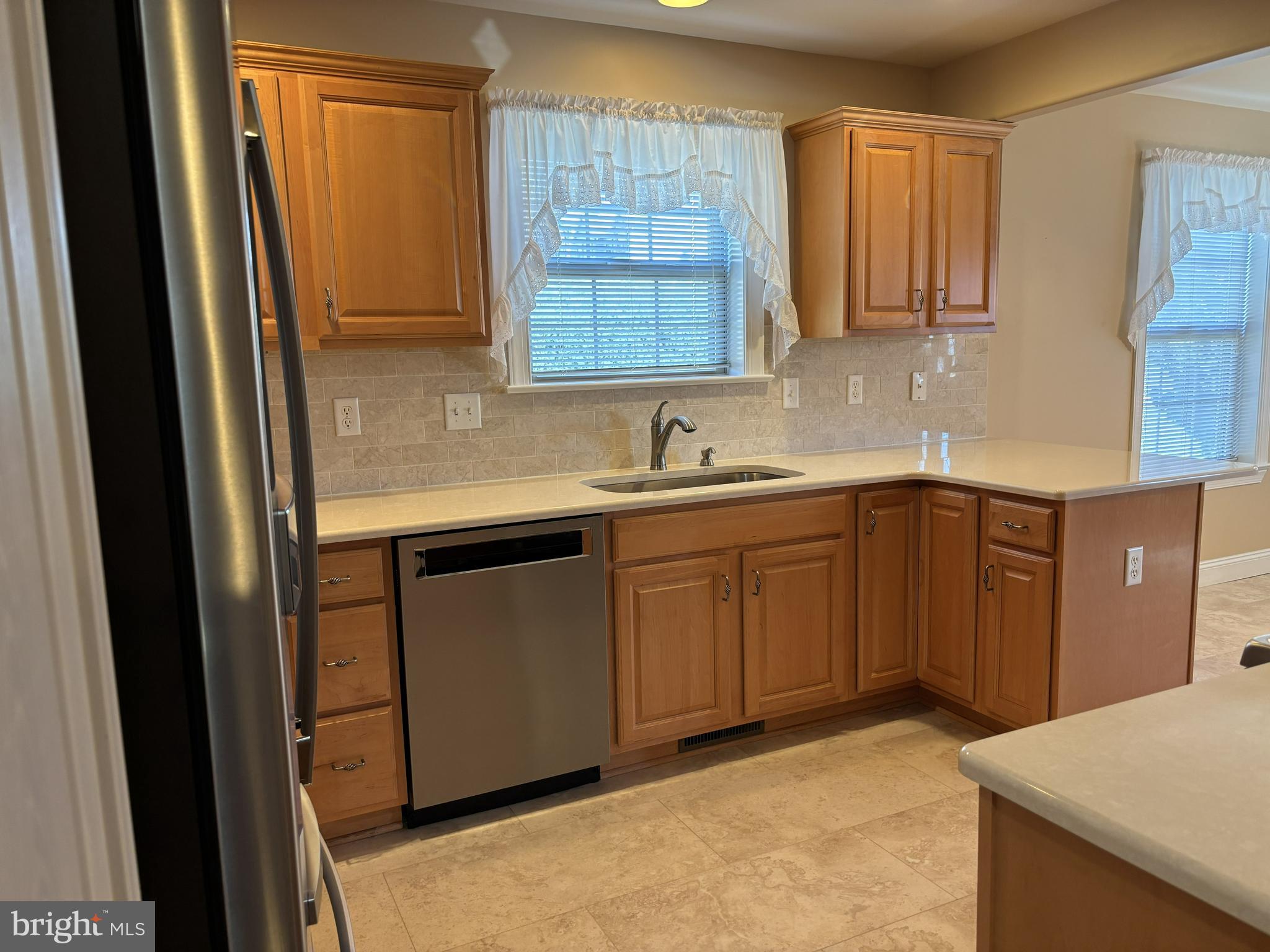 4300 North Victoria Way Harrisburg, PA 17112 - Photo 7 of 41 a kitchen with a sink cabinets and window