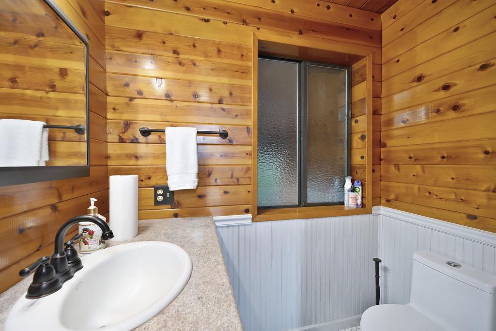 6301 Canyon Creek Road Georgetown, CA 95635 - Photo 26 of 87 a bathroom with a sink and a mirror