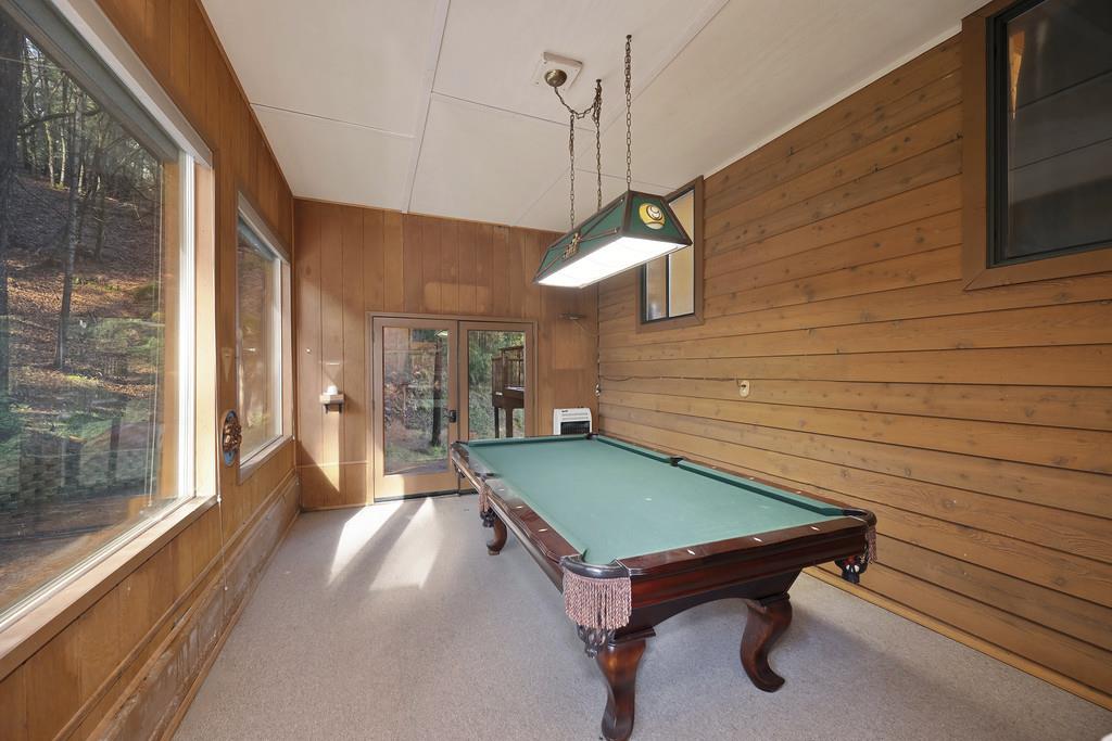 6301 Canyon Creek Road Georgetown, CA 95635 - Photo 31 of 87 playroom with wood walls, billiards, french doors, and carpet flooring
