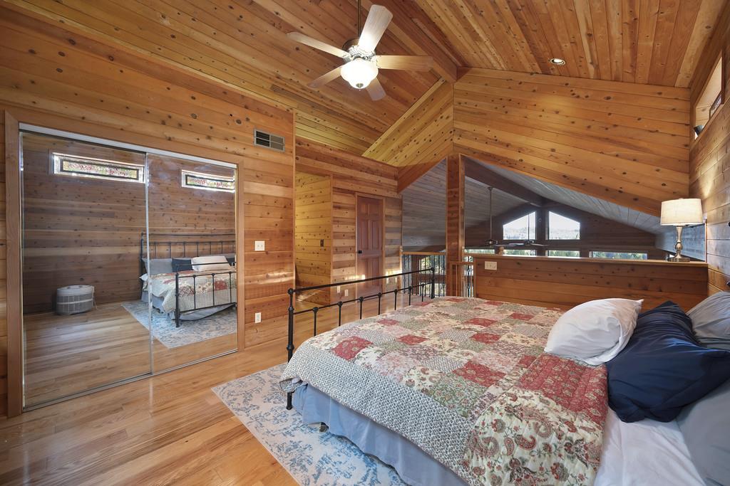 6301 Canyon Creek Road Georgetown, CA 95635 - Photo 37 of 87 bedroom with wood walls, wooden ceiling, wood finished floors, a ceiling fan, and access to outside
