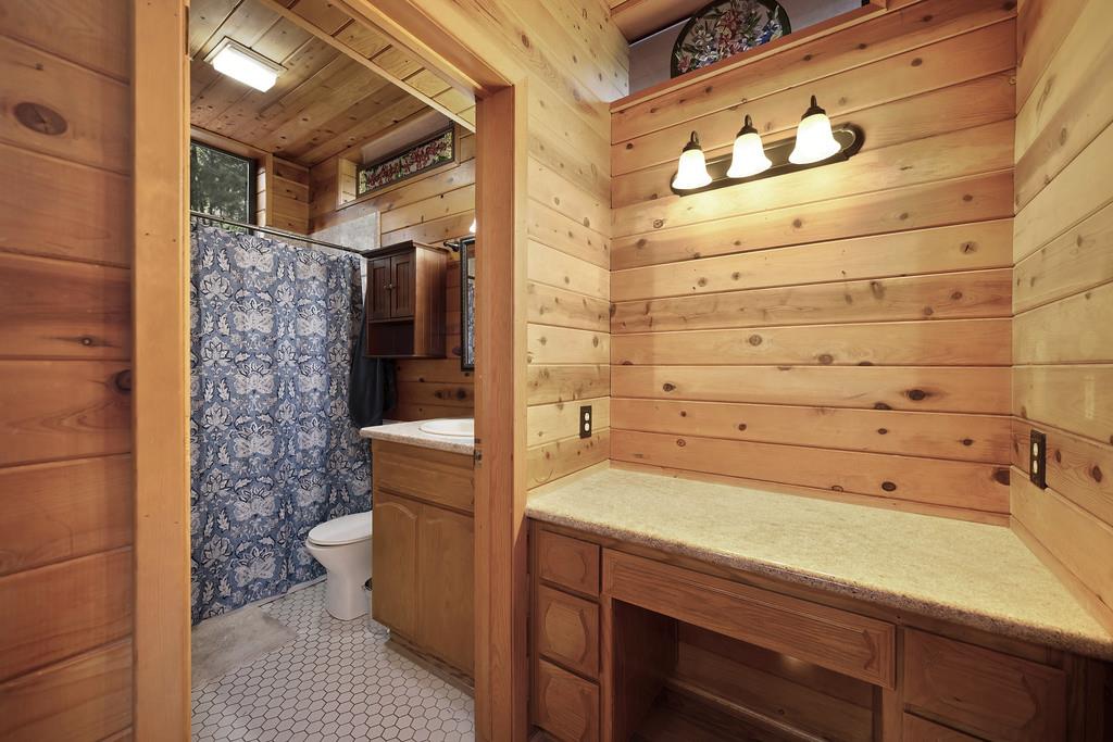 6301 Canyon Creek Road Georgetown, CA 95635 - Photo 39 of 87 a bathroom with a sink and a shower