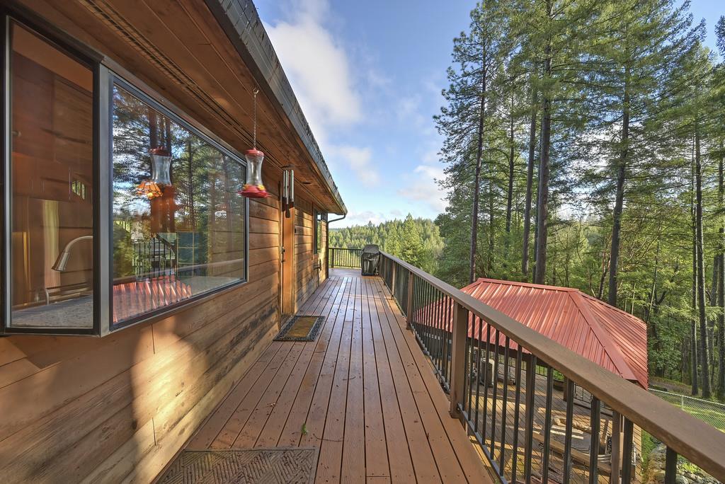 6301 Canyon Creek Road Georgetown, CA 95635 - Photo 41 of 87 a view of balcony with wooden floor and fence