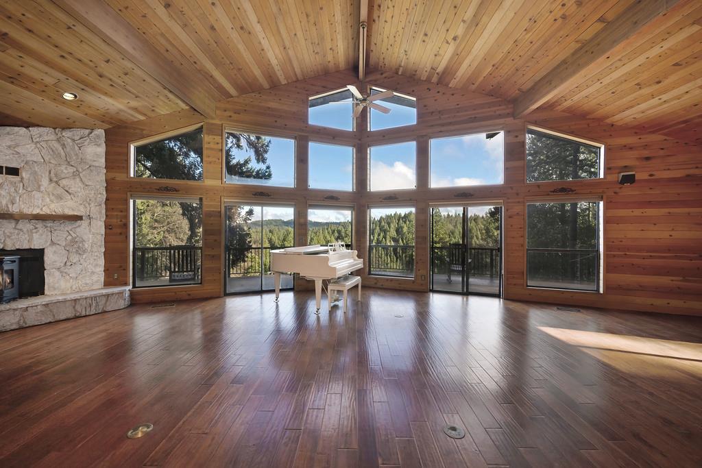 6301 Canyon Creek Road Georgetown, CA 95635 - Photo 8 of 87 a view of a dining room with furniture window and wooden floor