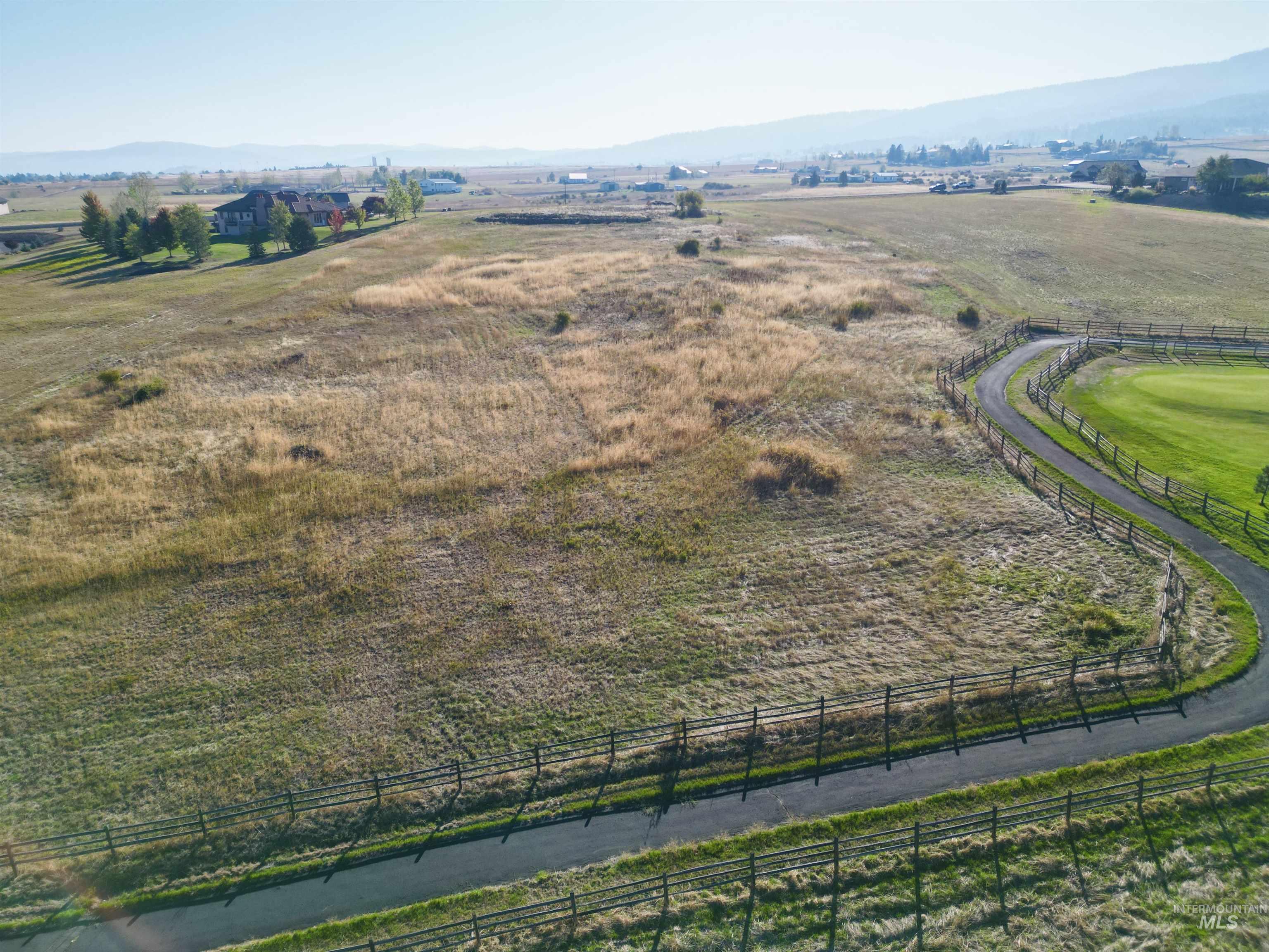 164 Ridgeview Drive Grangeville, ID 83530 - Photo 13 of 14 Aerial view of sparsely populated area with a mountainous background
