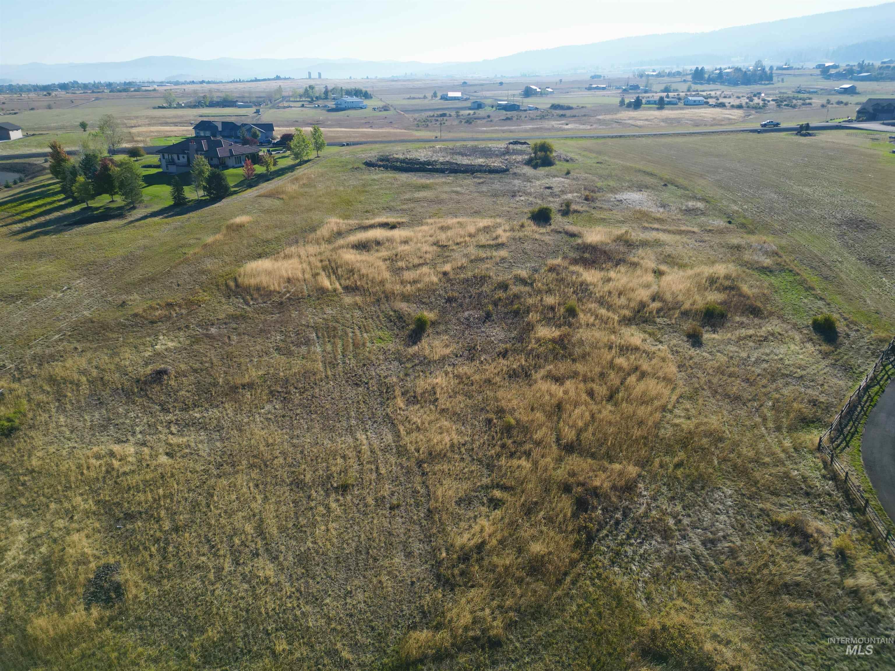 164 Ridgeview Drive Grangeville, ID 83530 - Photo 14 of 14 Aerial overview of property's location with a mountainous background and rural landscape