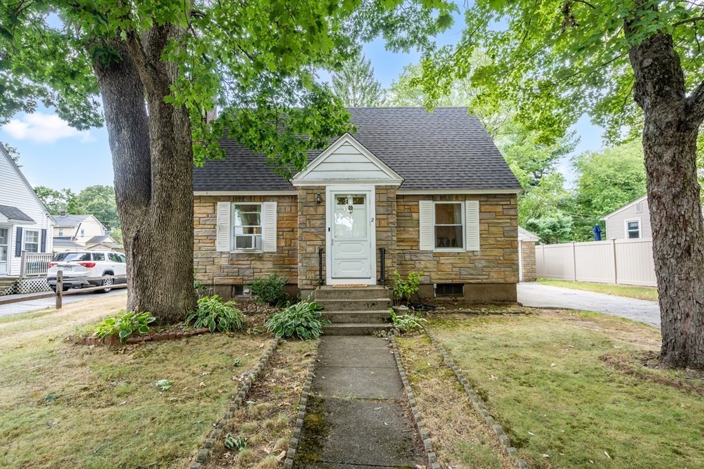 2 Westbrook Circle Worcester, MA 01602 - Photo 1 of 17 a front view of a house with a yard and trees