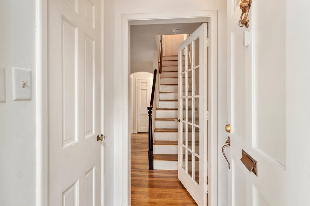 2 Westbrook Circle Worcester, MA 01602 - Photo 3 of 17 a view of a hallway with wooden floor and staircase