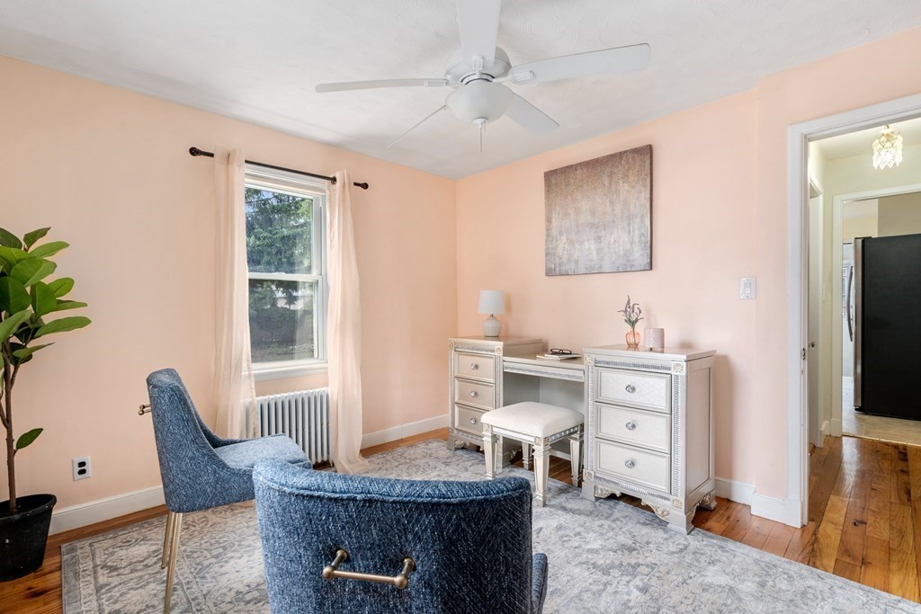 2 Westbrook Circle Worcester, MA 01602 - Photo 9 of 17 a living room with furniture a flat screen tv and a window