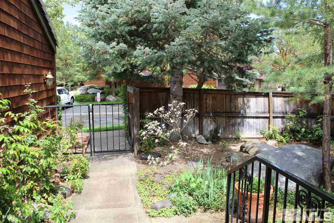 654 West Riverview Circle, Unit 654 Reno, NV 89509 - Photo 2 of 17 a view of a porch with a garden