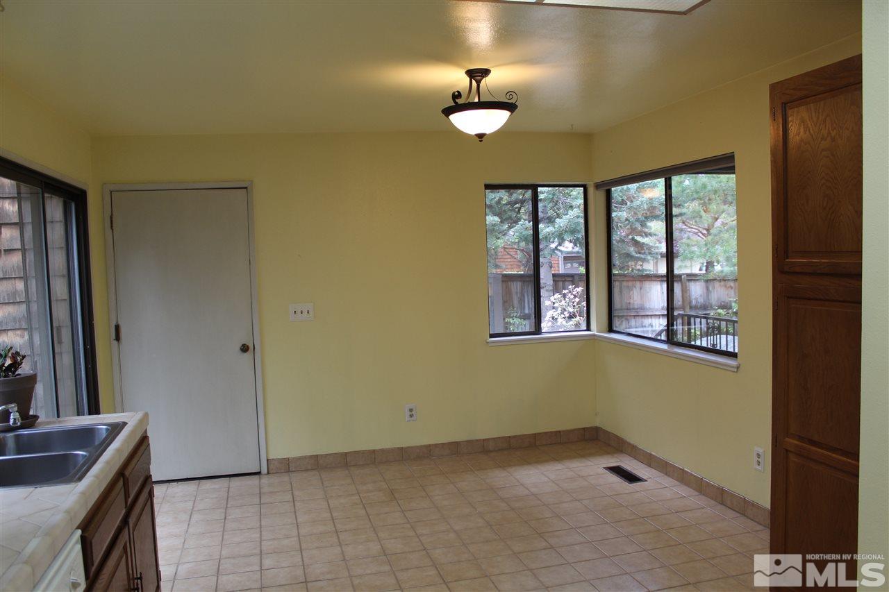 654 West Riverview Circle, Unit 654 Reno, NV 89509 - Photo 5 of 17 a view of an empty room with a window