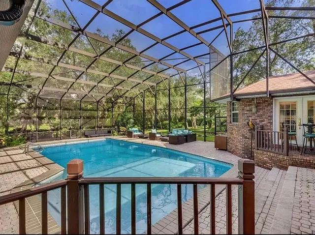 a view of staircase with wooden floor