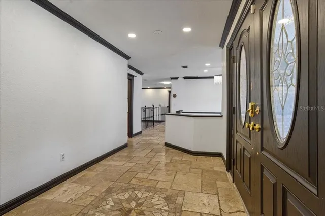 a view of entryway with wooden floor
