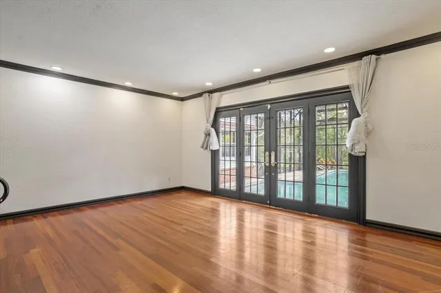 a view of an empty room and window