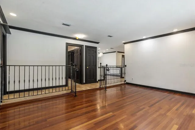 a large spacious bathroom with a tub shower and sink