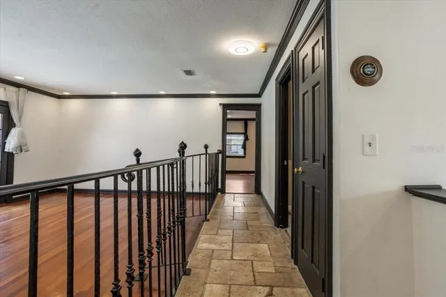 a white bath tub sitting in a bathroom next to a window