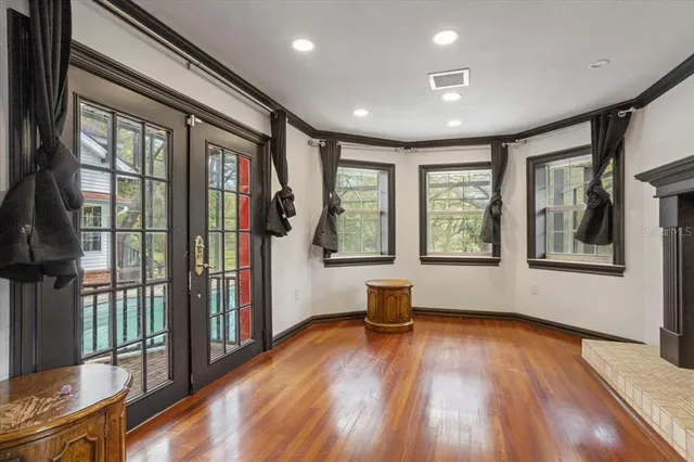 a large kitchen with kitchen island a sink counter space and stainless steel appliances