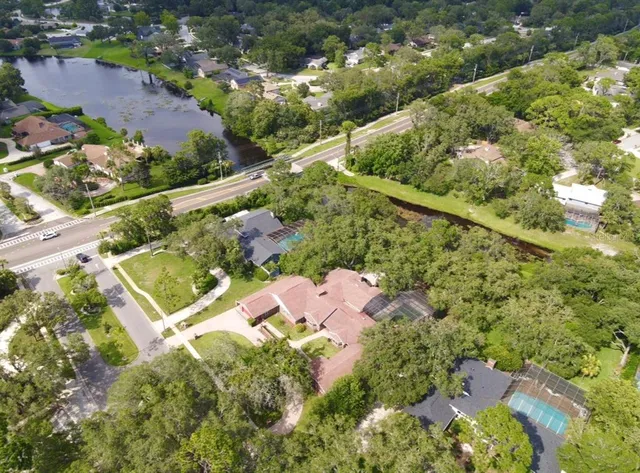 an aerial view of residential house with outdoor space