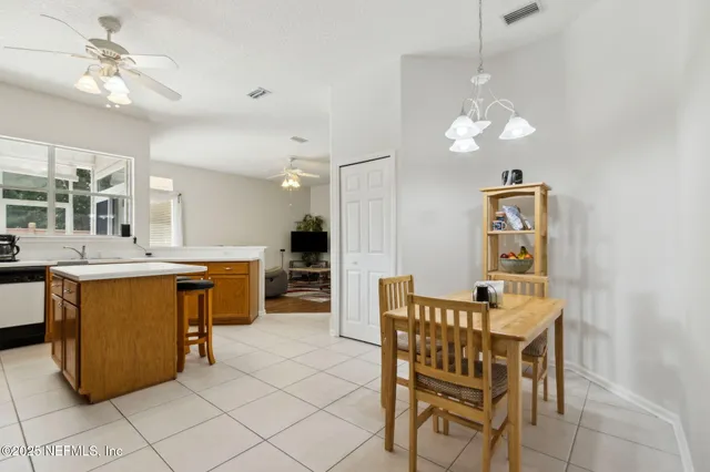 a view of kitchen with breakfast area